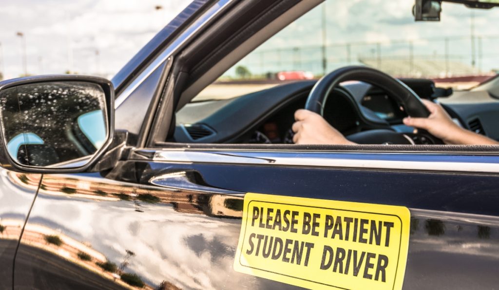 "Please be Patient, Student Driver" sticker on a car