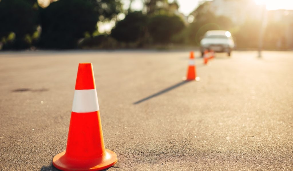 Defensive driving course with cones on the road